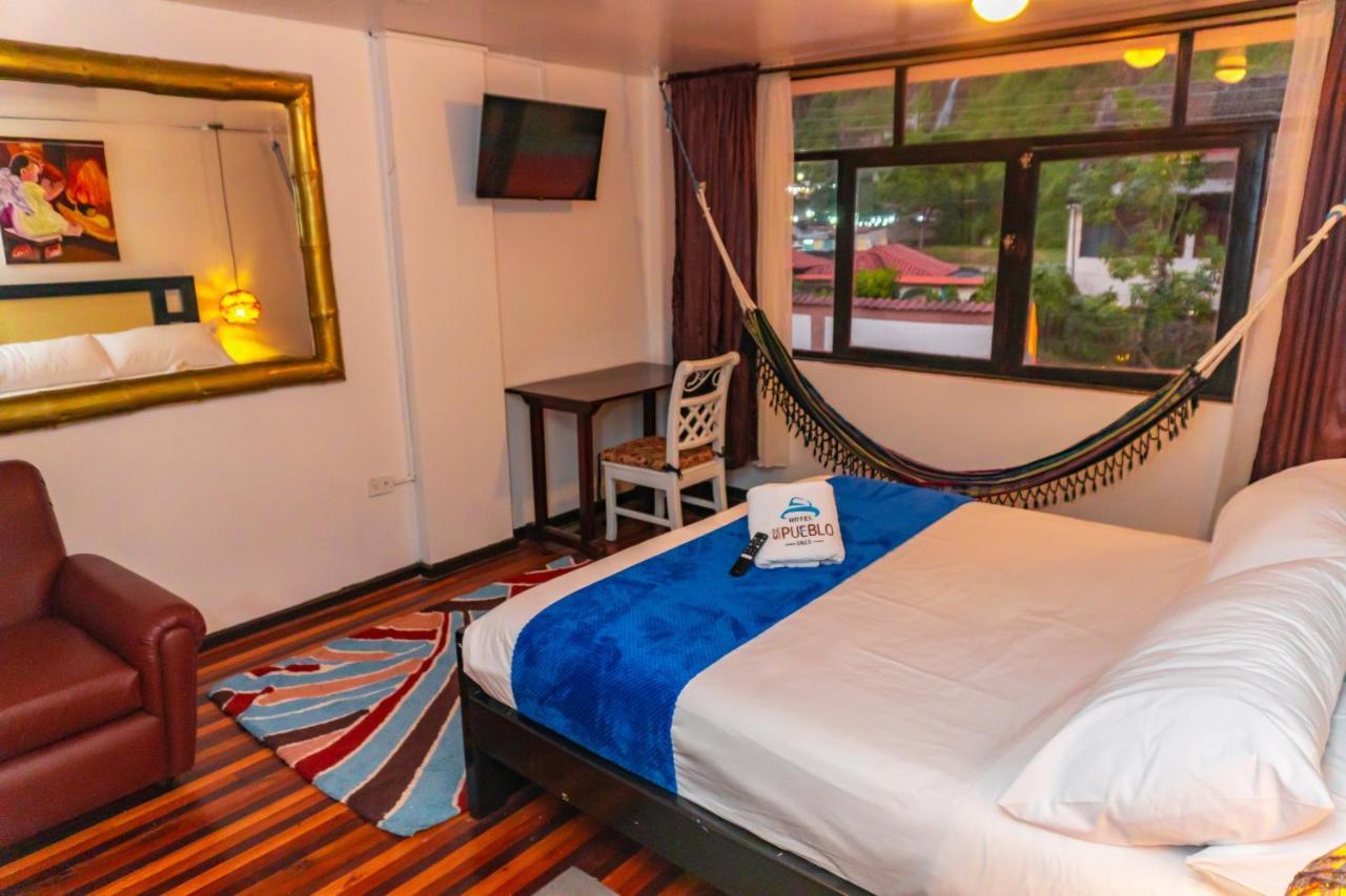 Hotel De Mi Pueblo Baños Eksteriør billede