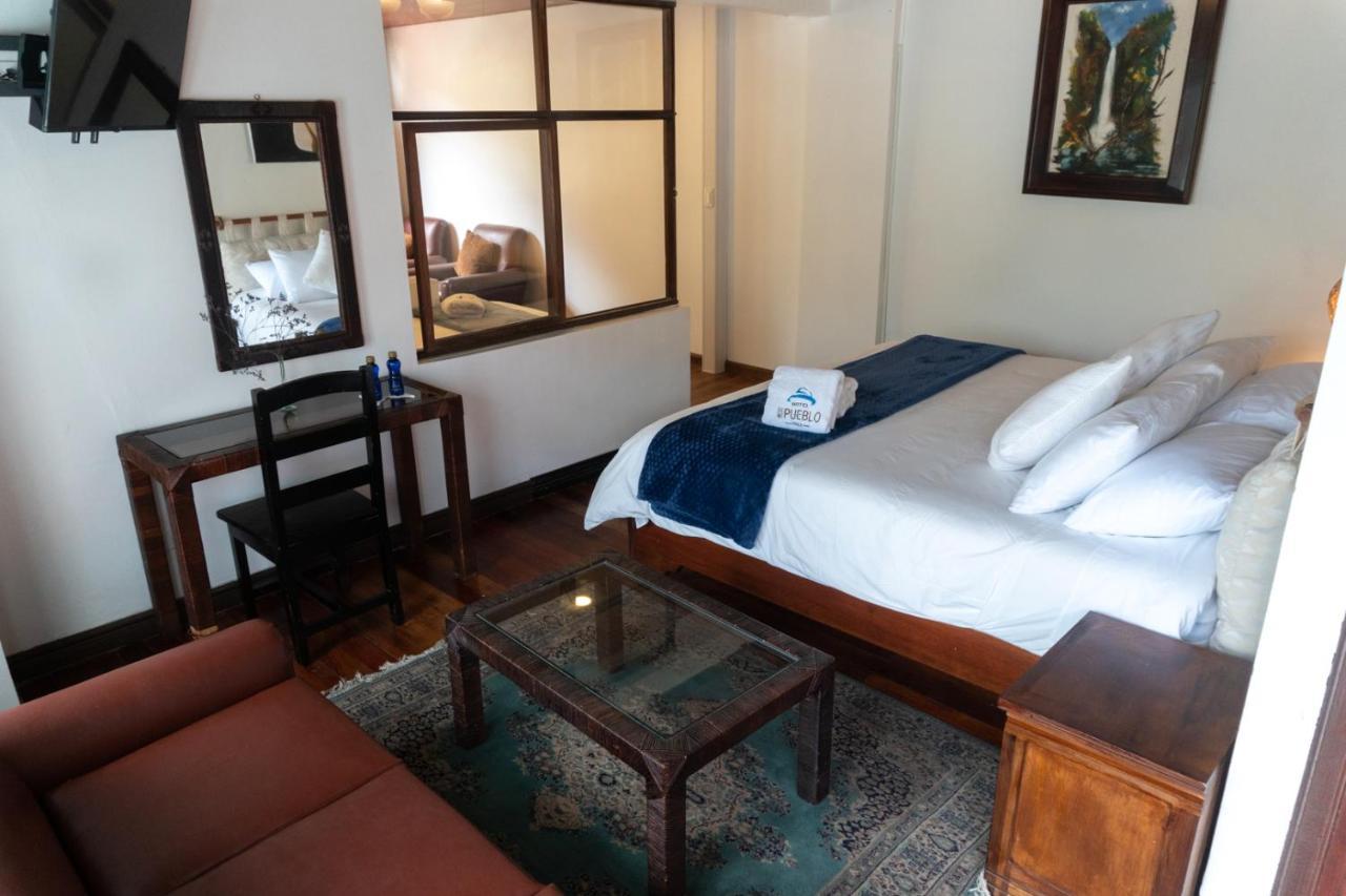 Hotel De Mi Pueblo Baños Eksteriør billede